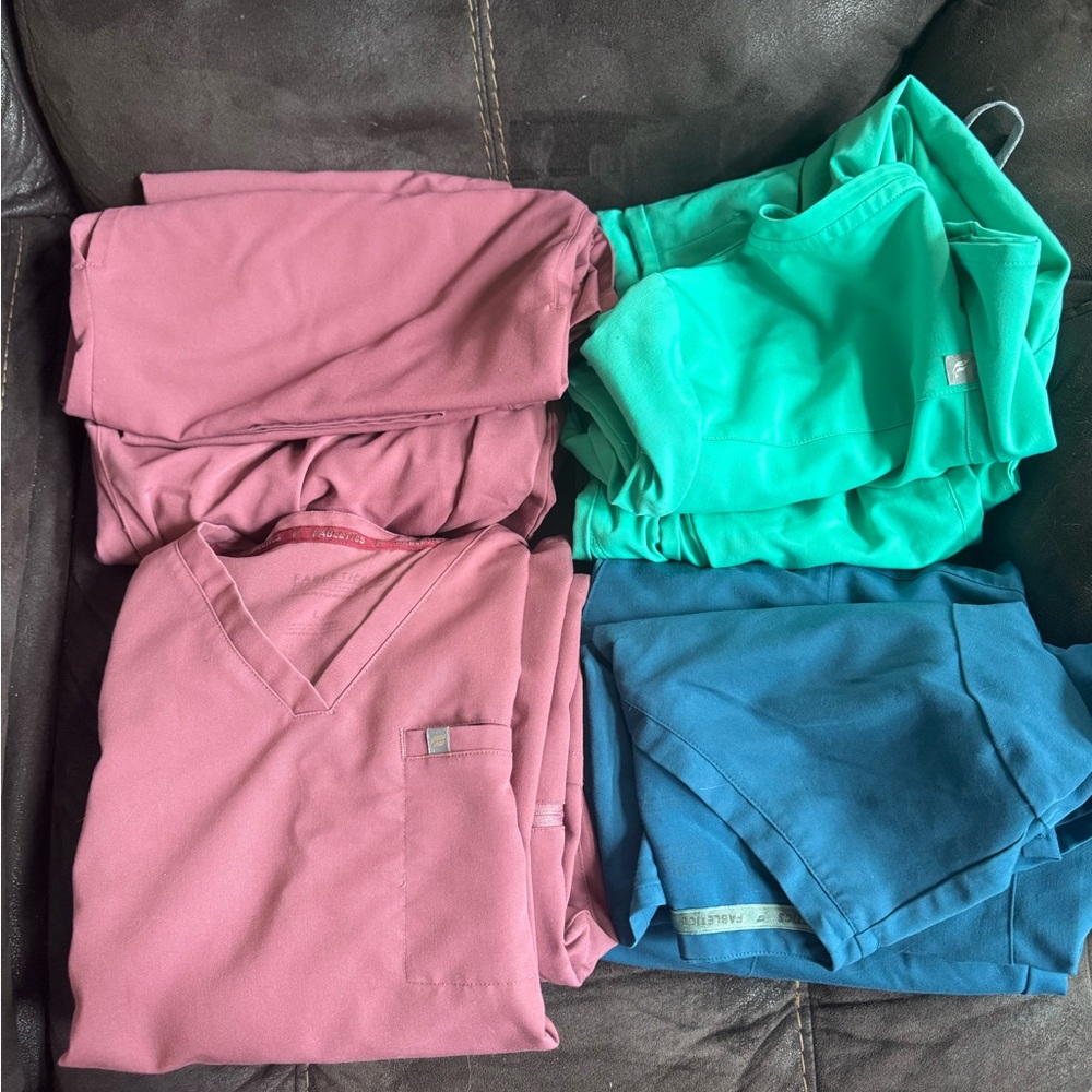 Fabletics Women’s Scrub Tops in Dusty Rose, Teal, and Blue